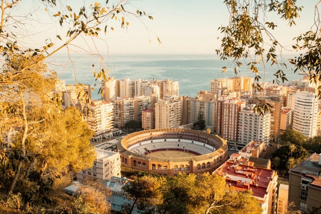 View Over Malaga At Sunset Travel Banner