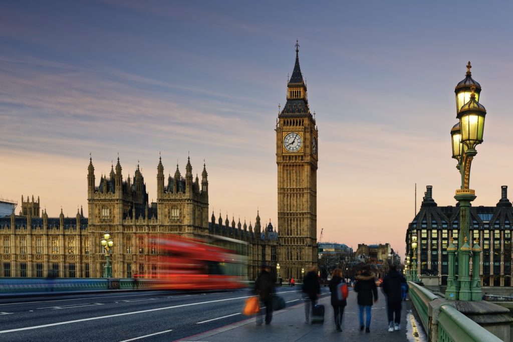 Uk, London, Big Ben, Houses Of Parliament And Bus On Westminster Bridge At Dusk